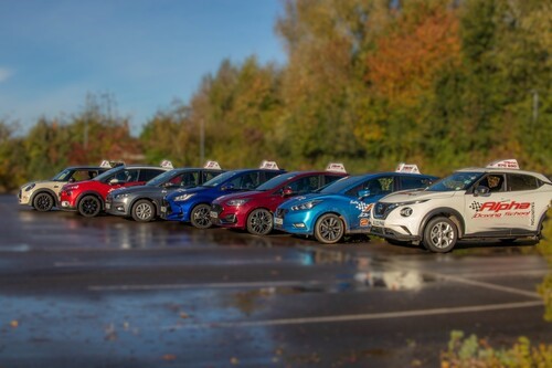 Car line-up at Alpha Driving School