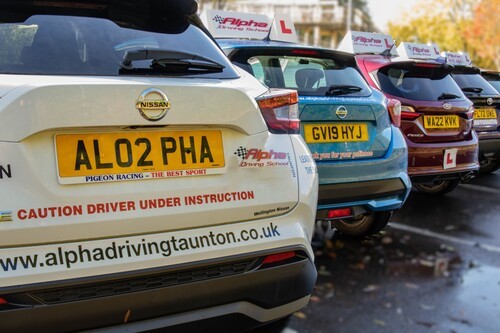 Back view of Alpha driving school cars